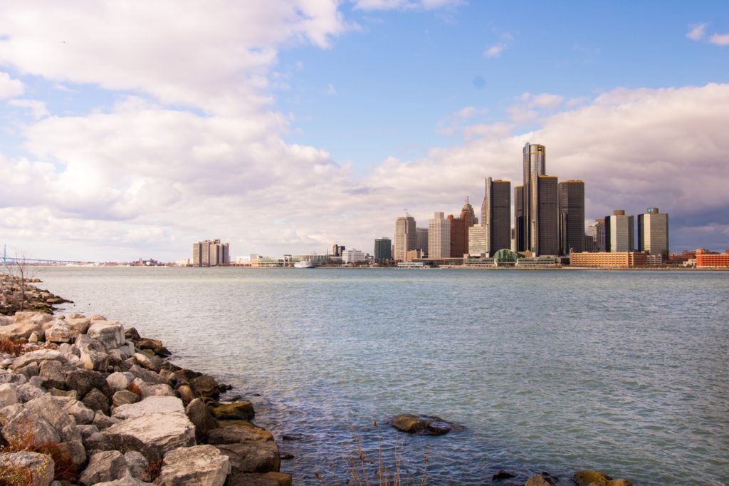 A picture of the Detroit, Michigan skyline and the Detroit River as viewed from Canada.