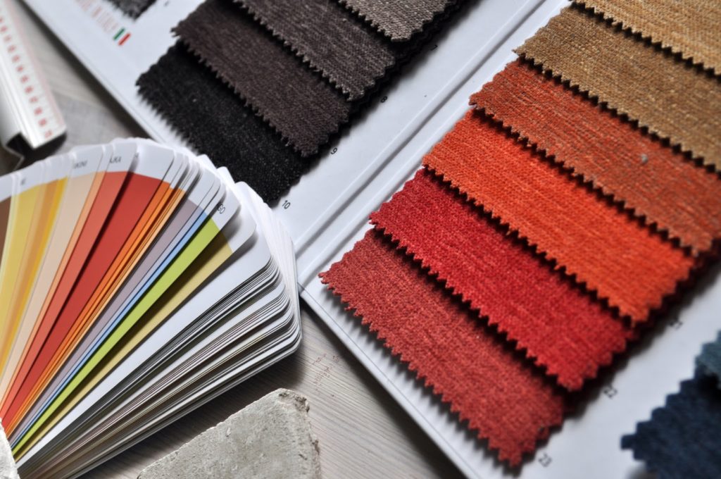 Swatches of fabric and paint in a variety of shades and colors.