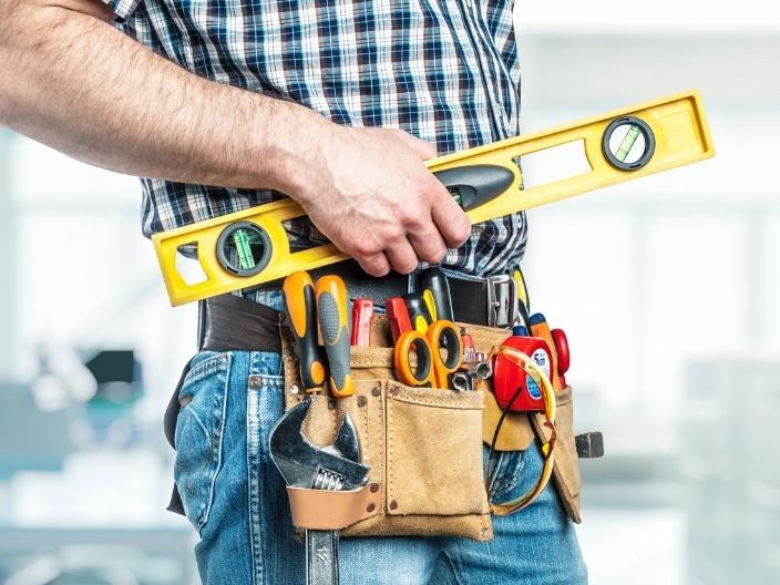 licensed contractor handyman holding tools