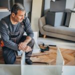 handyman doing indoor wood work inside home