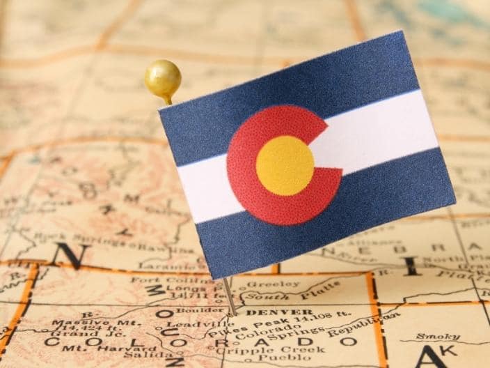 colorado flag pinned on map