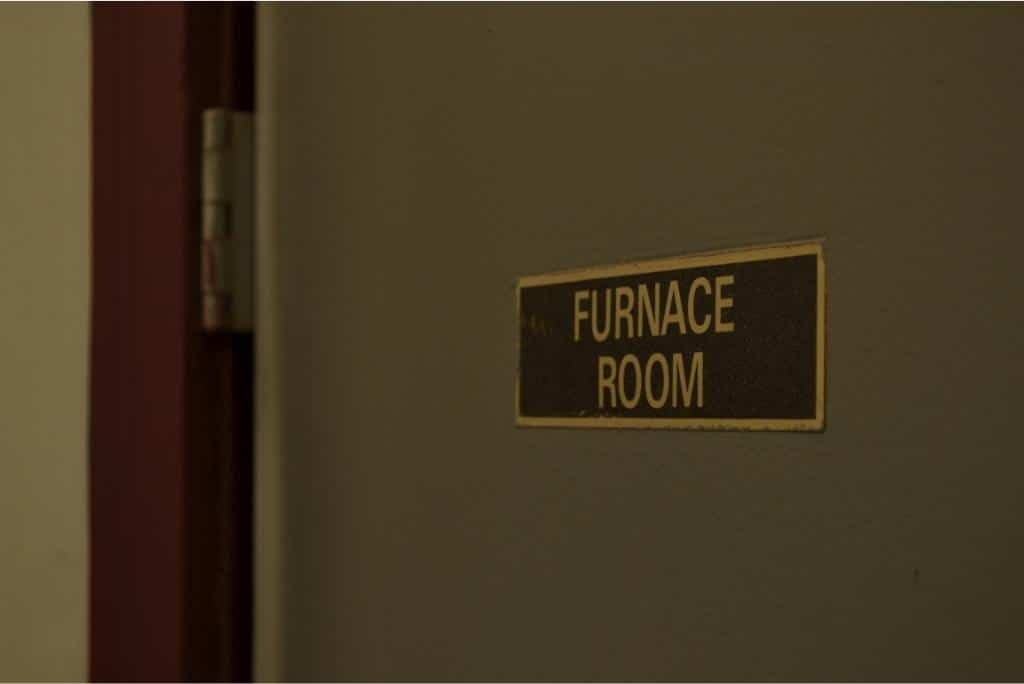 Furnace room door sign on door